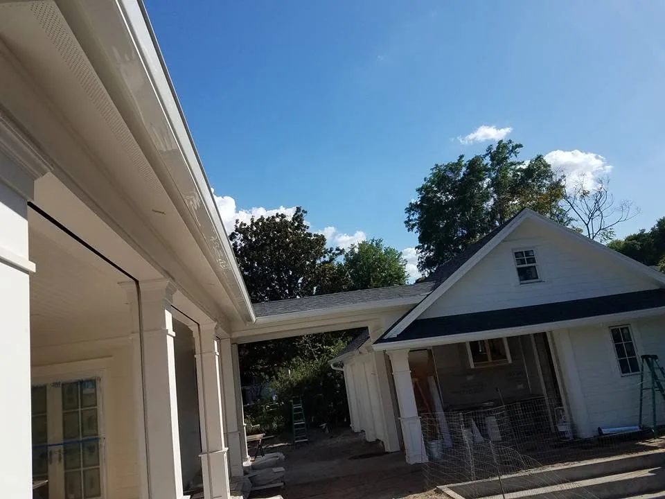 White fascia gutter breezeway porch columns gable cottage construction, Sanford